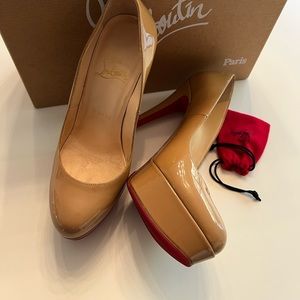 Bianca louboutin pumps